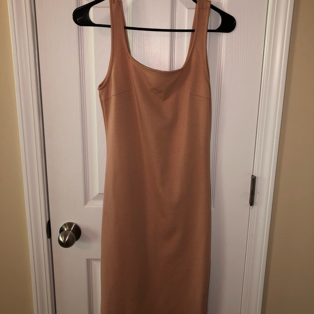 Blush pink, over the knee fitted dress.